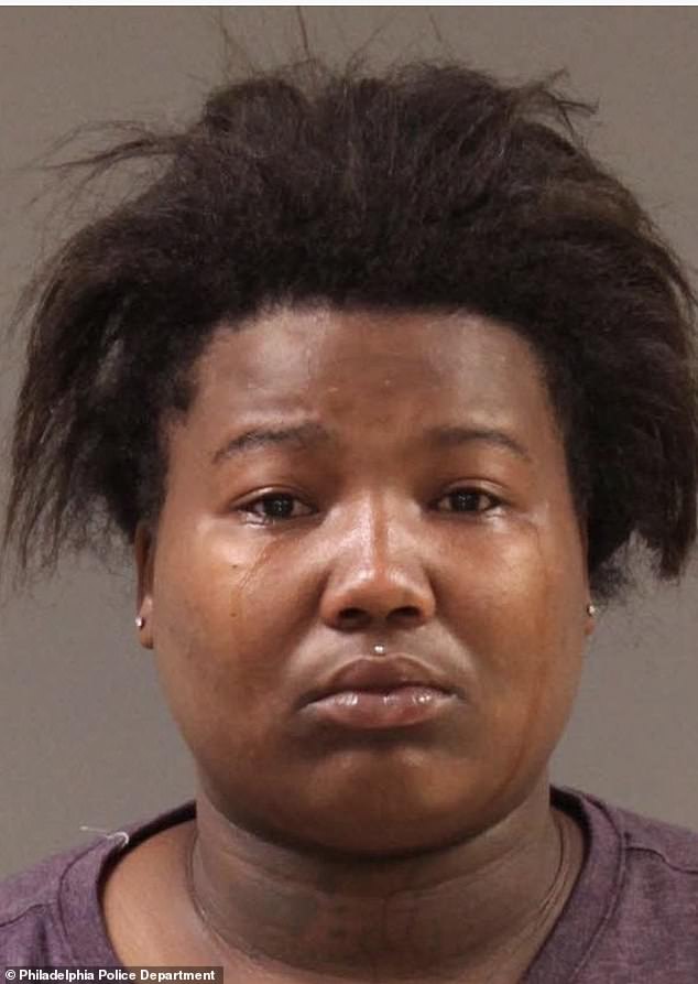 Dayjia Blackwell, 21, who livestreamed a looting campaign in Philadelphia and encouraged others to join in, appeared distraught as police took her mugshot