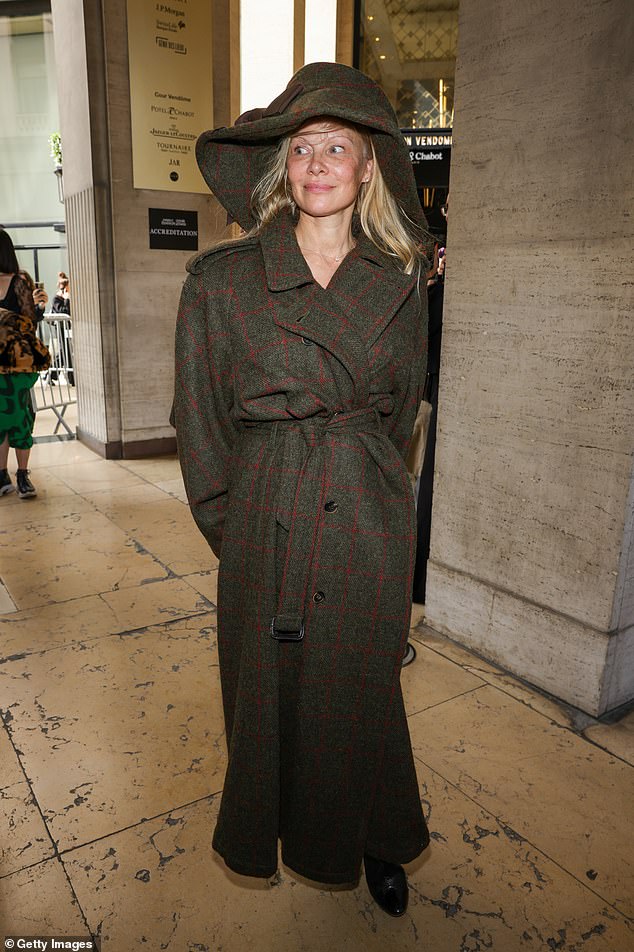 Have fun: At the Vivienne Westwood Spring/Summer 2024 show, she wore a large coat that tied loosely with a belt that tied in the front