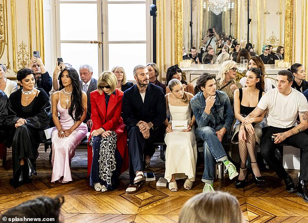 Star-Studded: However, it has been confirmed that Anna and Kim sat next to each other for the entire show;  pictured LR Kris Jenner, Kim, Anna, David, Harper Beckham, Cruz Beckham, Nicola Peltz, Brooklyn Beckham
