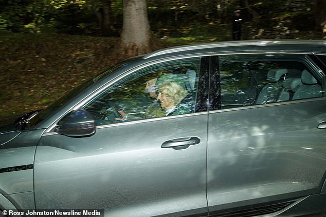 The couple looked relaxed without royal aides in the car as they whizzed through the winding streets around Balmoral