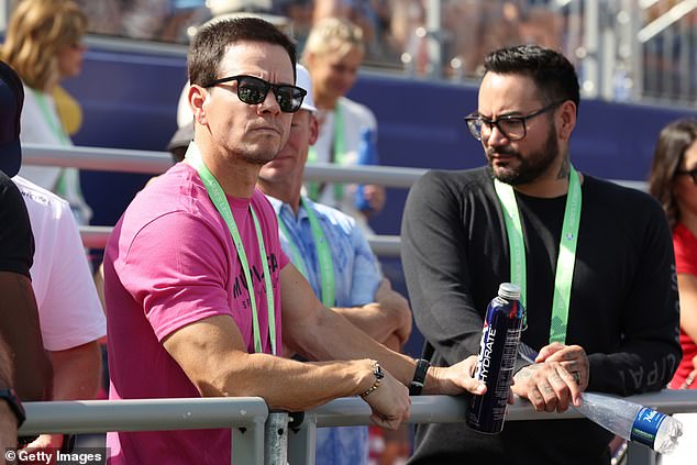 Day out: Mark Wahlberg was also spotted enjoying the match