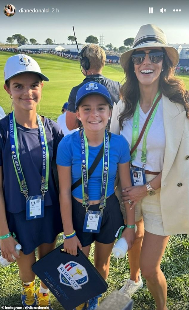 Diane also posed with two of her three daughters as they flashed the biggest smiles in a show of support for their dad's big day