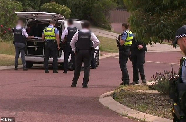 According to police reports, Ms. Garlett was found bleeding from several stab wounds by emergency responders at a neighbor's home.  Pictured: WA Police in Jules Court, Wilagee