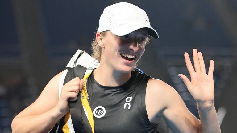 Iga Swiatek of Poland reacts to spectators after defeating Japan's Mai Hontama of Japan during the 16-match singles round of the Toray Pan Pacific Open Tennis at Ariake Coliseum and Ariake Tennis Forest Park in Koto Ward, Tokyo on September 27, 2023. Swiatek defeated Hontama 2-0.  (The Yomiuri Shimbun via AP Images)