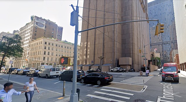 Surrounded by other normal looking buildings, 33 Thomas Street sticks out like a sore thumb and towers into the sky