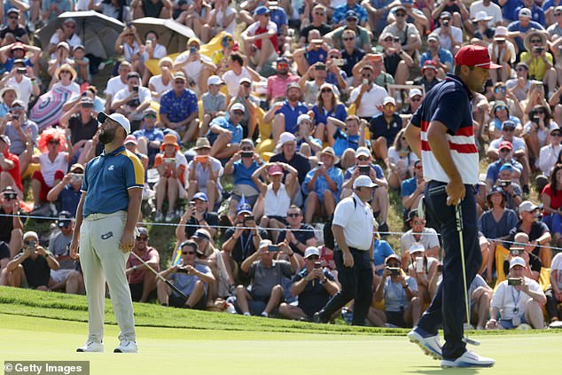 Rahm (left) and Scheffler (right) drew their singles matches as Europe moved closer to victory