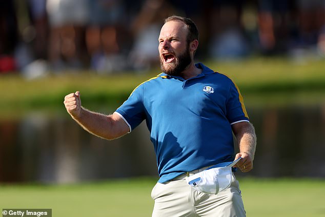 Tyrrell Hatton punched the air in delight as his win brought Europe within half a point of the Ryder Cup