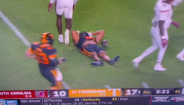 His leg appeared to be twisted at a 90 degree angle as he lay on the turf in obvious pain