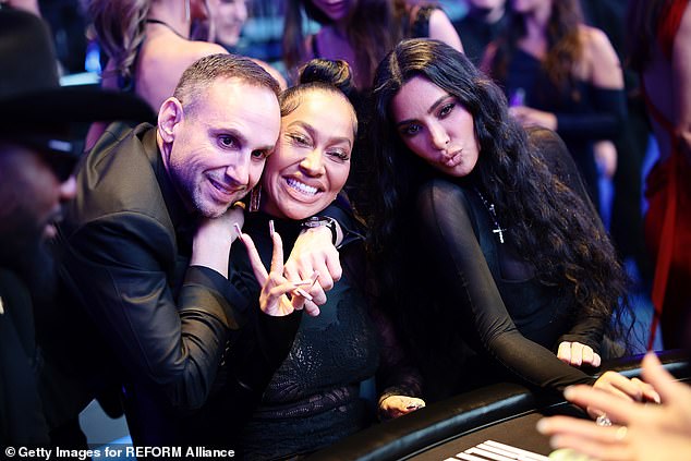 Friends: Kim tried her luck at the tables with friend LaLa Anthony and Michael Rubin, one of the co-founders of the Reform Alliance