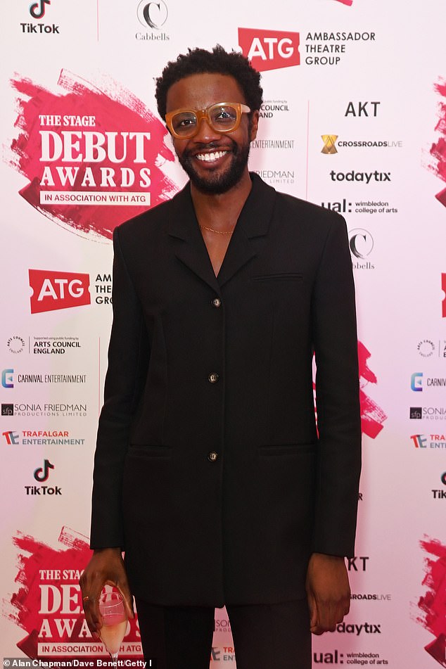 Ensemble: Omari Douglas looked suave in an all-black suit as he looked radiant