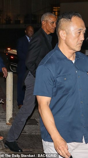 Barack was flanked by security guards as he left Funke restaurant in Beverly Hills