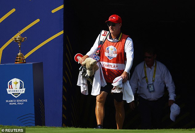 Cantlay's caddy Joe LaCava was roundly booed as he walked to the first tee