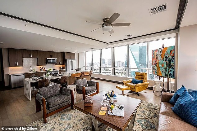 Photos obtained by DailyMail.com from an advertisement for her 36th-floor apartment show panoramic city views and mid-century modern furnishings