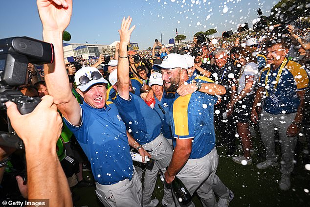 Justin Rose, Jon Rahm and Team Europe teammates celebrate winning the Ryder Cup during Sunday's singles matches