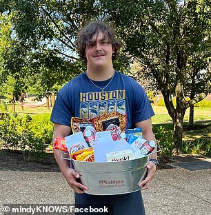 Student holding a mother gift basket