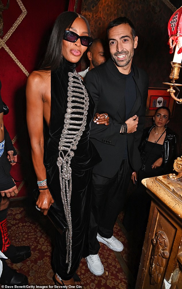 Stunning: The event was packed with models, with Naomi Campbell, 53, making a stylish entrance in a long black dress adorned with silver chains (pictured with Mohammed Al Turki)