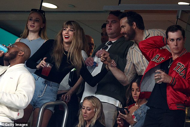 Furious NFL fans have criticized the fanfare surrounding Taylor Swift (pictured with Ryan Reynolds) and her rumored boyfriend Travis Kelce after NBC spoke to the singer 17 different times during Sunday night's broadcast of the Jets-Chiefs game