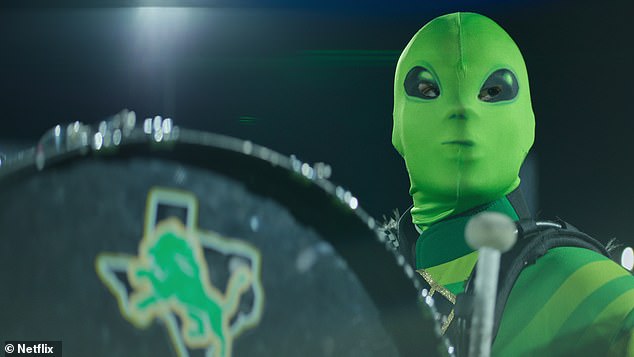 Revelation: The series interviews witnesses and skeptics, but also uncovers new evidence.  Pictured: A Texas football team's marching band celebrates the local UFO event