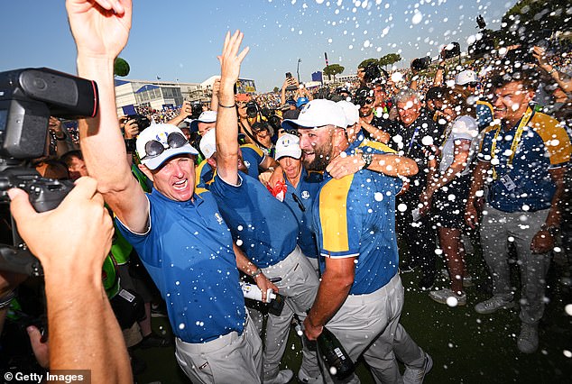 Justin Rose, Jon Rahm and Team Europe teammates celebrate winning the Ryder Cup during Sunday's singles matches