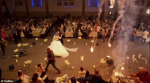 Newlyweds Haneen and Ravan were slow dancing at their Christian wedding in the northern city of Qaraqosh near Mosul when their ceremony descended into chaos.