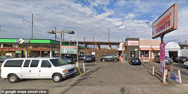 The Dunkin store on North 52nd Street was dark and deserted when approached by looters in the early hours of Wednesday morning