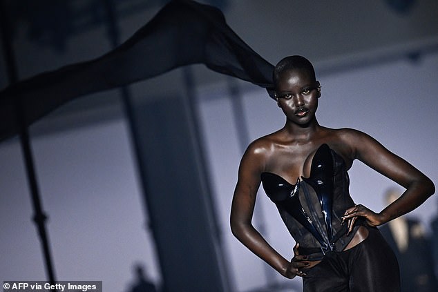 I say: South Sudanese-Australian model Adut Akech Bior presents a creation for the Mugler fashion show as part of the Paris Fashion Week Womenswear Spring/Summer 2024