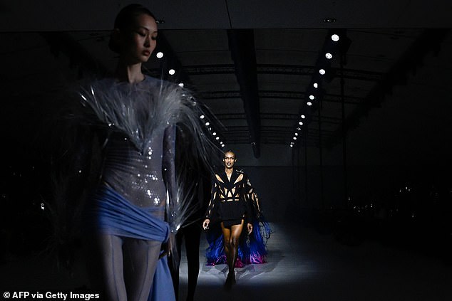 Fashion first: a group of models walked the catwalk as they unveiled the new collection