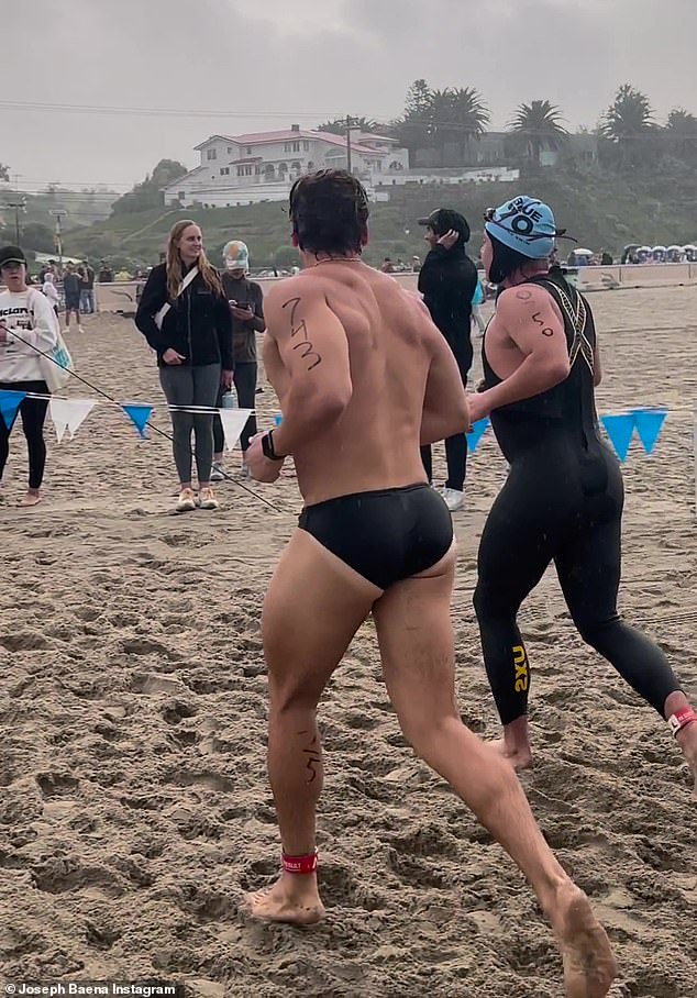 Wow: The muscular actor wore nothing but a pair of tiny black panties as he took a dip in the ocean before running through the sand