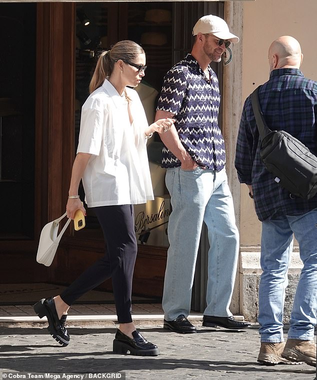 Serving looks: The sexyback hitmaker was seen carrying a gold bag from Borsalino, a world-famous hat shop in Rome