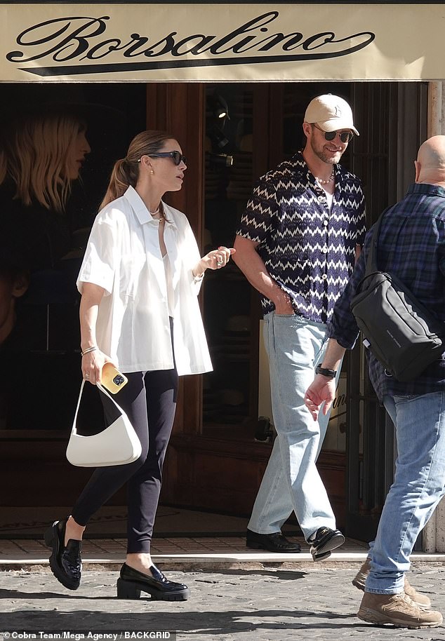 Couple Goals: The Minnesota-born stunner got her man laughing as she left Borsalino's hat shop