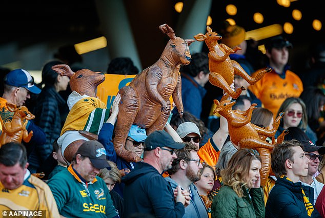 The menacing Wallabies fan sat down at McLennan's table and ordered him to drink from a glass of milk in a confrontation that left the Rugby Australia boss shocked.