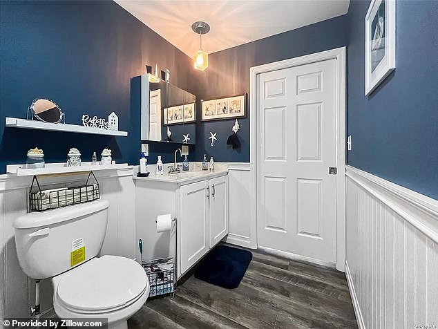 The home comes complete with two bathrooms decorated in coastal colors