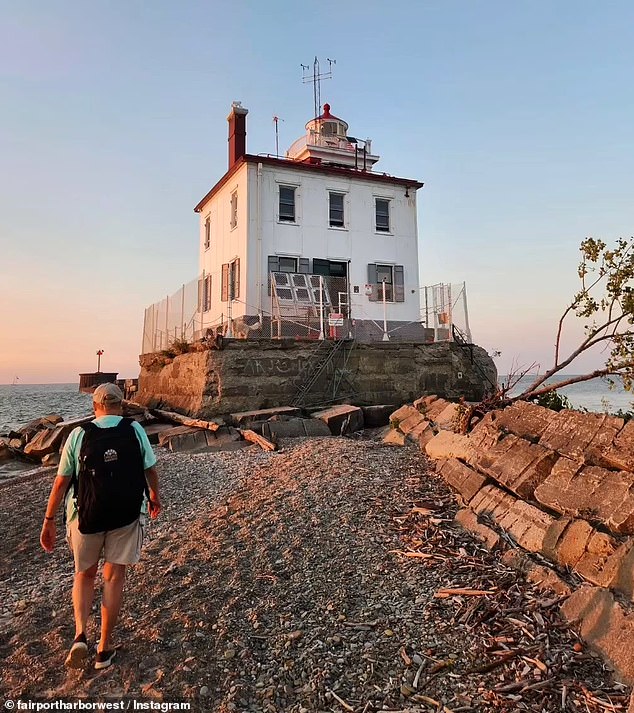 Because the lighthouse is located so close to the water on such a narrow piece of land, roads cannot access it.  That means she has to walk about half a mile every time she goes out