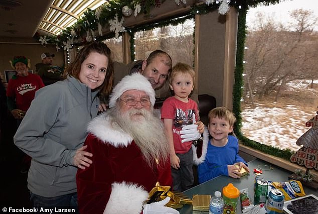 Doug and Amy Larsen and their two young children in a photo on social media