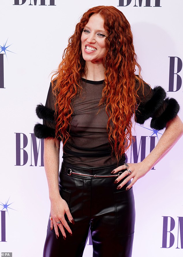 Gorgeous: Jess looked nothing short of sensational in her fall outfit, matching her nail polish with her gorgeous auburn locks