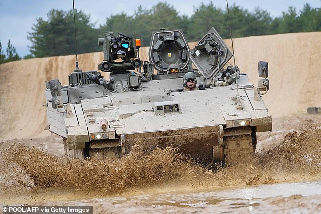 An Ajax Ares armored vehicle, on the training range of Bovington Camp, a British Army military base where Ukrainian soldiers undergo training, February 22