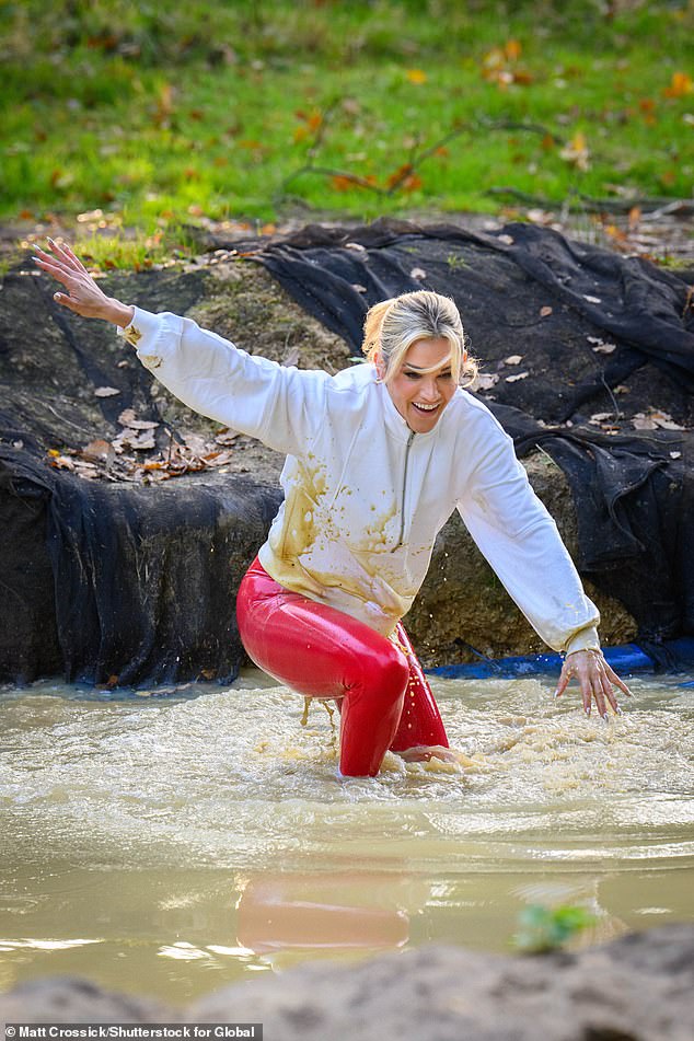 Gruelling: Ashley, who created 'The Nuts Challenge', had 50 minutes while live on Heart Breakfast where she had to crawl on her hands and knees and climb around obstacles along banks and cargo nets