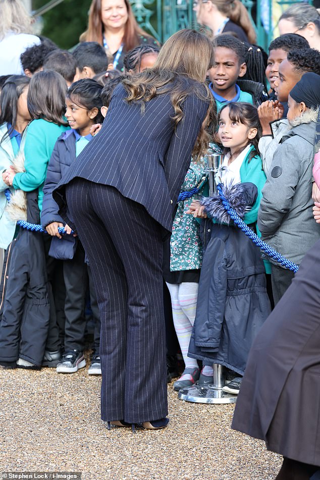 The Princess of Wales chatted to some schoolgirls who looked a little surprised to meet a princess