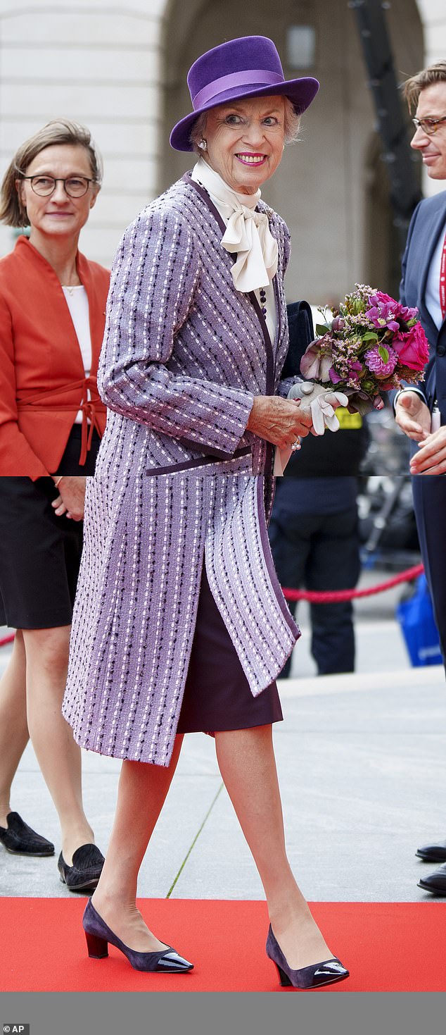 Princess Benedkeek opted for a sophisticated purple coat and matching pumps for the annual event