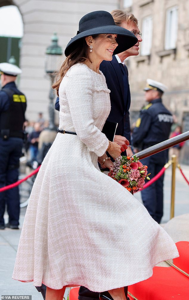 Princess Mary looked elegant in the beautiful dress, which featured a stylish black belt around the waist