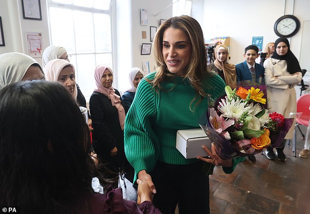 The royal, 52, listened to refugees tell their stories of arriving in Belfast and learning English during a visit to the Conway Education Center