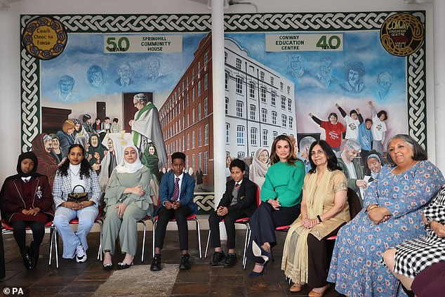 Queen Rania (third from right) meets refugees from the Conway Education Center while attending the One Young World Summit in Conway Mill