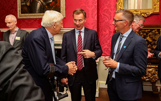 Around 5,300 people in Britain are diagnosed with sarcoma, an aggressive form of cancer of the soft tissue or bone, every year.  But survival rates are low, with more than 100 different subtypes, making effective diagnosis and treatment even more difficult.  The event, hosted at 11 Downing Street, was organized by Charlie from his hospital bed in Royal Marden, London.  Pictured is Jeremy Hunt with Richard Davidson (right), CEO of Sarcoma UK