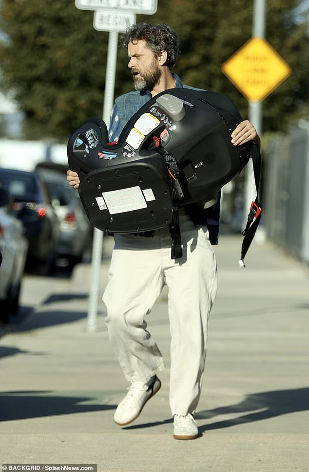 Getting Out: The Dawson's Creek alum carried the car seat onto the road