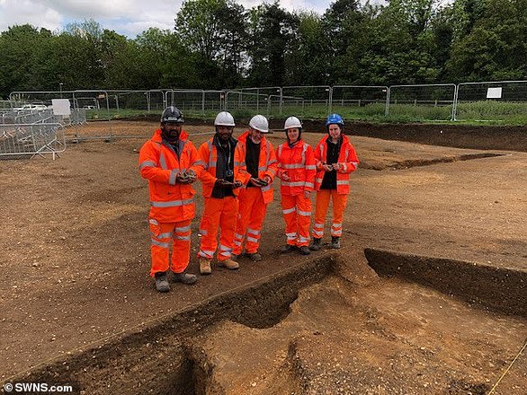 The millstone and others were uncovered three years ago during roadworks to improve a 21-mile stretch of the A14 between Cambridge and Huntingdon.  The photo shows the excavation site