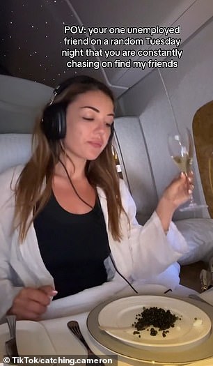 In another clip, she drank some more champagne while dining on caviar