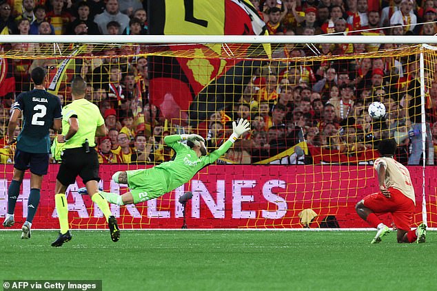 The RC Lens striker curled a shot into the net after a mistake by David Raya