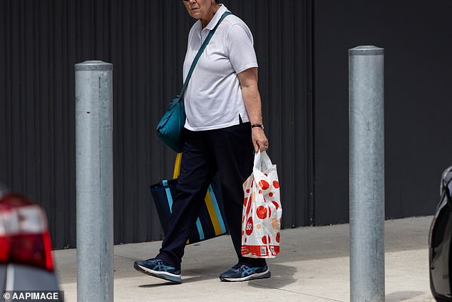 The shopper, from the Mornington Peninsula, south-east of Melbourne, sparked debate after sharing his concerns on Facebook, saying baby boomers needed to 'be more considerate of time-poor workers and busy parents' (pictured Coles shopper in Melbourne)