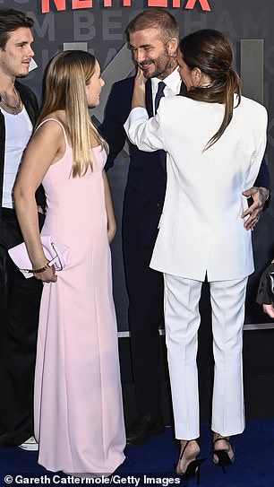 Close: The couple showered each other with affection while attending the launch of the upcoming Netflix documentary series BECKHAM at the O2 Arena in London