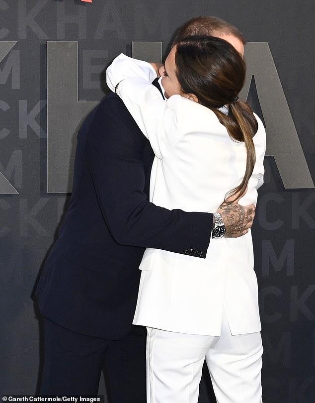 Smitten: The couple hugged as they entered the O2 Arena ahead of the documentary's first official screening on Tuesday evening